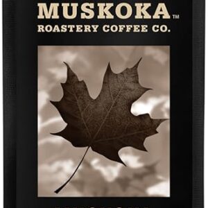 Black bag of Muskoka Roastery Coffee Co.'s Muskoka Maple, a medium-flavoured Canadian coffee featuring a maple leaf graphic and labeled 454g (1lb). A great option for Canadian coffee gifts, blending local maple flavour with artisan roasting